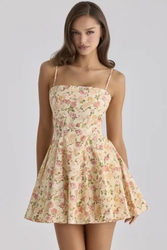 Dolly Warm Rose Print Baumwoll-Sommerkleid mit ausgestelltem Rock Dolly Warm Rose Print Baumwoll-Sommerkleid mit ausgestelltem Rock