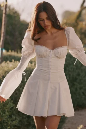 Ellerie Weißes Minikleid aus Baumwolle mit Flötenärmeln
