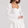 Ellerie Weißes Minikleid aus Baumwolle mit Flötenärmeln Ellerie Weißes Minikleid aus Baumwolle mit Flötenärmeln