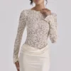 Ellie Vintage Elfenbein-Spitzen-Bodys mit langen Ärmeln Ellie Vintage Elfenbein-Spitzen-Bodys mit langen Ärmeln