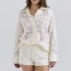 Eman Weiße Baumwoll-Shorts mit Broderie Anglaise Eman Weiße Baumwoll-Shorts mit Broderie Anglaise