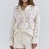 Eman Weiße Baumwoll-Shorts mit Broderie Anglaise Eman Weiße Baumwoll-Shorts mit Broderie Anglaise