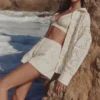 Eman Weiße Baumwoll-Shorts mit Broderie Anglaise Eman Weiße Baumwoll-Shorts mit Broderie Anglaise