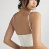 Emilee – Korsett aus elfenbeinfarbenem Satin und Spitze Emilee – Korsett aus elfenbeinfarbenem Satin und Spitze