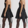 Emmanuela Schwarzes trägerloses Minikleid mit abnehmbarem Schleifen Emmanuela Schwarzes trägerloses Minikleid mit abnehmbarem Schleifen