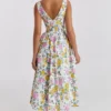 Emmelina Weißes Baumwoll-Korsett-Sommerkleid mit Vintage-Rosenprint Emmelina Weißes Baumwoll-Korsett-Sommerkleid mit Vintage-Rosenprint