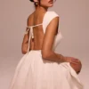 Enchant Weißes Minikleid mit offenem Rücken Enchant Weißes Minikleid mit offenem Rücken