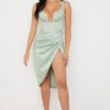 Faye Midi-Korsetts-Kleid aus Pistaziengrünem Satin Faye Midi-Korsetts-Kleid aus Pistaziengrünem Satin