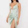 Faye Midi-Korsetts-Kleid aus Pistaziengrünem Satin Faye Midi-Korsetts-Kleid aus Pistaziengrünem Satin