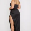 Flora – Midi-Kleid aus schwarzem Satin mit Plissee und Korsett Flora – Midi-Kleid aus schwarzem Satin mit Plissee und Korsett