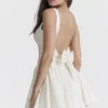 Florianne Elfenbeinfarbenes Baumwoll-Minikleid mit Schleife Florianne Elfenbeinfarbenes Baumwoll-Minikleid mit Schleife