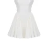 Florianne Elfenbeinfarbenes Baumwoll-Minikleid mit Schleife Florianne Elfenbeinfarbenes Baumwoll-Minikleid mit Schleife