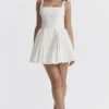 Florianne Elfenbeinfarbenes Baumwoll-Minikleid mit Schleife Florianne Elfenbeinfarbenes Baumwoll-Minikleid mit Schleife