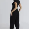 Caia Schwarzes Bouclé-Strick-Oberteil aus Wolle Caia Schwarzes Bouclé-Strick-Oberteil aus Wolle