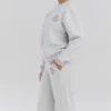 Haze Hellgraues meliertes Sweatshirt mit Rundhalsausschnitt Haze Hellgraues meliertes Sweatshirt mit Rundhalsausschnitt