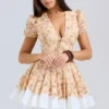 Imani Mini-Kleid aus plissierter Baumwolle mit Honeyflower-Print Imani Mini-Kleid aus plissierter Baumwolle mit Honeyflower-Print