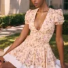 Imani Mini-Kleid aus plissierter Baumwolle mit Honeyflower-Print Imani Mini-Kleid aus plissierter Baumwolle mit Honeyflower-Print