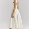 Isabeau Midi-Korsetts aus strukturiertem Satin in Elfenbein Isabeau Midi-Korsetts aus strukturiertem Satin in Elfenbein