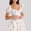 Issa Cremefarbenes Minikleid aus Baumwolle mit Blumenprint Issa Cremefarbenes Minikleid aus Baumwolle mit Blumenprint