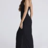 Issey Schwarzes, drapiertes Maxikleid aus Stretch-Mesh Issey Schwarzes, drapiertes Maxikleid aus Stretch-Mesh