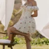 Jaide Minikleid aus Stretch-Baumwolle mit Blumenprint und schulterfreiem Korsett Jaide Minikleid aus Stretch-Baumwolle mit Blumenprint und schulterfreiem Korsett