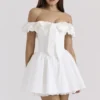 Jaide Weißes Baumwoll-Mini-Korsetts-Kleid mit schulterfreiem Ausschnitt Jaide Weißes Baumwoll-Mini-Korsetts-Kleid mit schulterfreiem Ausschnitt