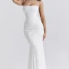 Joan Elfenbeinfarbenes Maxikleid mit Schnürung am Rücken Joan Elfenbeinfarbenes Maxikleid mit Schnürung am Rücken