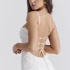 Joan Elfenbeinfarbenes Maxikleid mit Schnürung am Rücken Joan Elfenbeinfarbenes Maxikleid mit Schnürung am Rücken