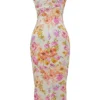 Josefina Elfenbeinfarbenes Maxikleid mit Blumenmuster Josefina Elfenbeinfarbenes Maxikleid mit Blumenmuster