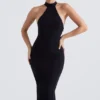 Juniper Schwarzes Midi-Kleid mit Schößchen Juniper Schwarzes Midi-Kleid mit Schößchen