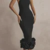 Juniper Schwarzes Midi-Kleid mit Schößchen Juniper Schwarzes Midi-Kleid mit Schößchen