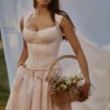 Kaia – Midi-Kleid aus rosa Baumwolle mit Flügelärmeln Kaia – Midi-Kleid aus rosa Baumwolle mit Flügelärmeln