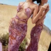 Kasia Lila Midi-Kleider mit Cut-outs
