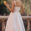 Kelly Weißes Midi-Sommerkleid im Korsetts-Stil Kelly Weißes Midi-Sommerkleid im Korsetts-Stil