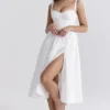 Kelly Weißes Midi-Sommerkleid im Korsetts-Stil Kelly Weißes Midi-Sommerkleid im Korsetts-Stil
