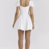 Lili Weißes Baumwoll-Minikleid mit abnehmbarem Korsett Lili Weißes Baumwoll-Minikleid mit abnehmbarem Korsett