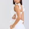 Lilibet Weißes besticktes Peplum-Korsetts-Oberteil aus Baumwolle Lilibet Weißes besticktes Peplum-Korsetts-Oberteil aus Baumwolle