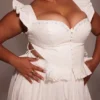 Lilibet Weißes besticktes Peplum-Korsetts-Oberteil aus Baumwolle Lilibet Weißes besticktes Peplum-Korsetts-Oberteil aus Baumwolle