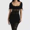Lilla Schwarzes Midi-Kleid aus durchbrochenem Strick Lilla Schwarzes Midi-Kleid aus durchbrochenem Strick