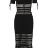 Lilla Schwarzes Midi-Kleid aus durchbrochenem Strick Lilla Schwarzes Midi-Kleid aus durchbrochenem Strick