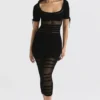 Lilla Schwarzes Midi-Kleid aus durchbrochenem Strick Lilla Schwarzes Midi-Kleid aus durchbrochenem Strick