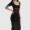 Lilla Schwarzes Midi-Kleid aus durchbrochenem Strick Lilla Schwarzes Midi-Kleid aus durchbrochenem Strick
