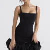 Lilou Schwarzes Kleid mit Rüschen an den Säumen