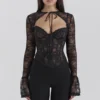 Lisette Schwarzes Spitzen-Korsetts-Oberteil mit Bolero Lisette Schwarzes Spitzen-Korsetts-Oberteil mit Bolero