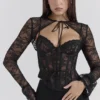 Lisette Schwarzes Spitzen-Korsetts-Oberteil mit Bolero Lisette Schwarzes Spitzen-Korsetts-Oberteil mit Bolero