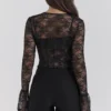 Lisette Schwarzes Spitzen-Korsetts-Oberteil mit Bolero Lisette Schwarzes Spitzen-Korsetts-Oberteil mit Bolero
