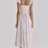 Livia Midi-Sommerkleid aus Baumwolle mit weißem Rosenprint Livia Midi-Sommerkleid aus Baumwolle mit weißem Rosenprint