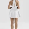 Loulette Weißes Minikleid mit Neckholder und Schleifen Loulette Weißes Minikleid mit Neckholder und Schleifen