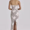 Lucienne – Elfenbeinfarbenes Maxikleid aus bestickter Spitze – Limitierte Edition Lucienne – Elfenbeinfarbenes Maxikleid aus bestickter Spitze – Limitierte Edition