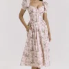 Lulabell Midi-Kleid aus Baumwolle mit rosa Schleifenprint Lulabell Midi-Kleid aus Baumwolle mit rosa Schleifenprint